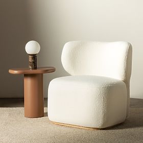 Fauteuil rembourré Imai blanc, formes arrondies
